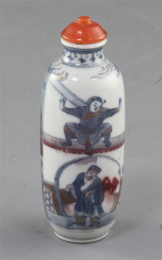 A Chinese underglaze blue and copper red snuff bottle, 19th century, 8.6cm excl. stopper